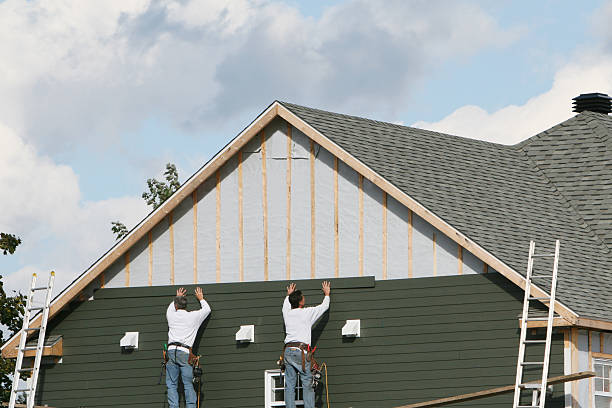 Professional Siding technician working in McAlisterville, PA